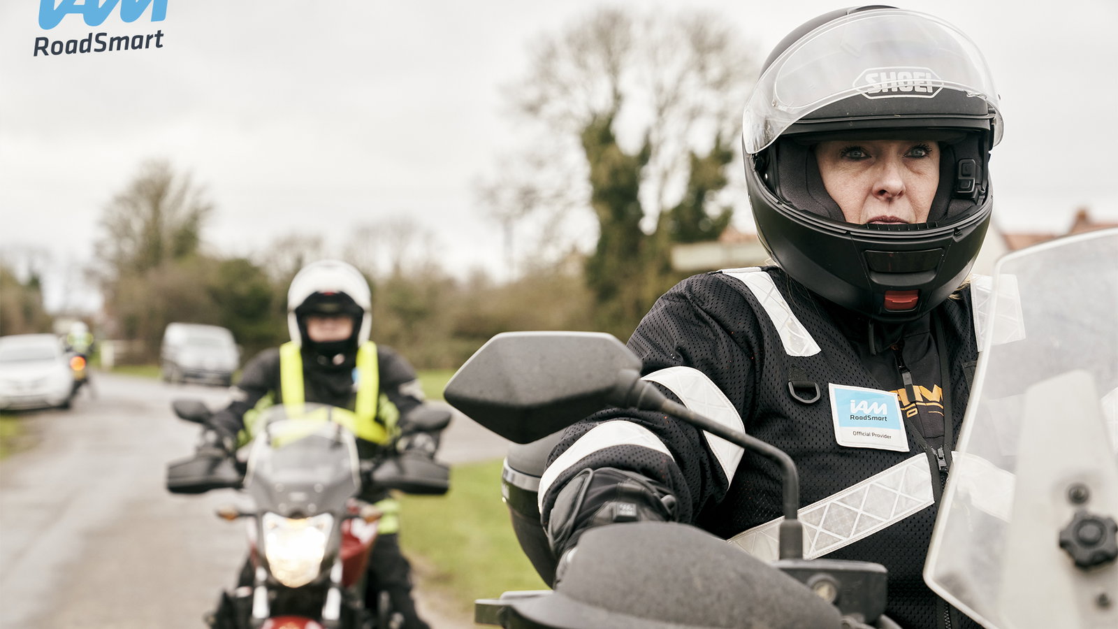 IAM Advanced Riding - Close up of two riders riding out together.